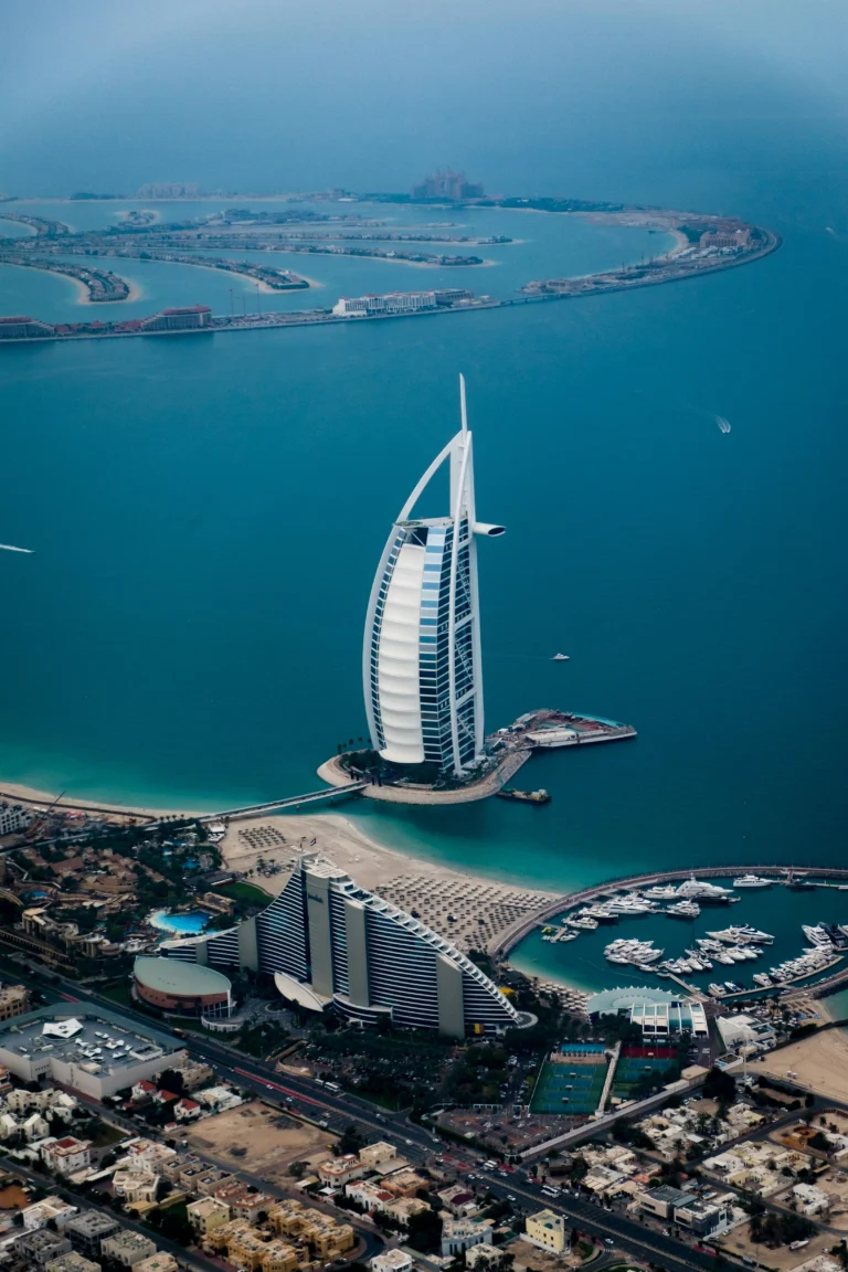 Aerial view of the Burj Al Arab hotel and surrounding coastline in Dubai