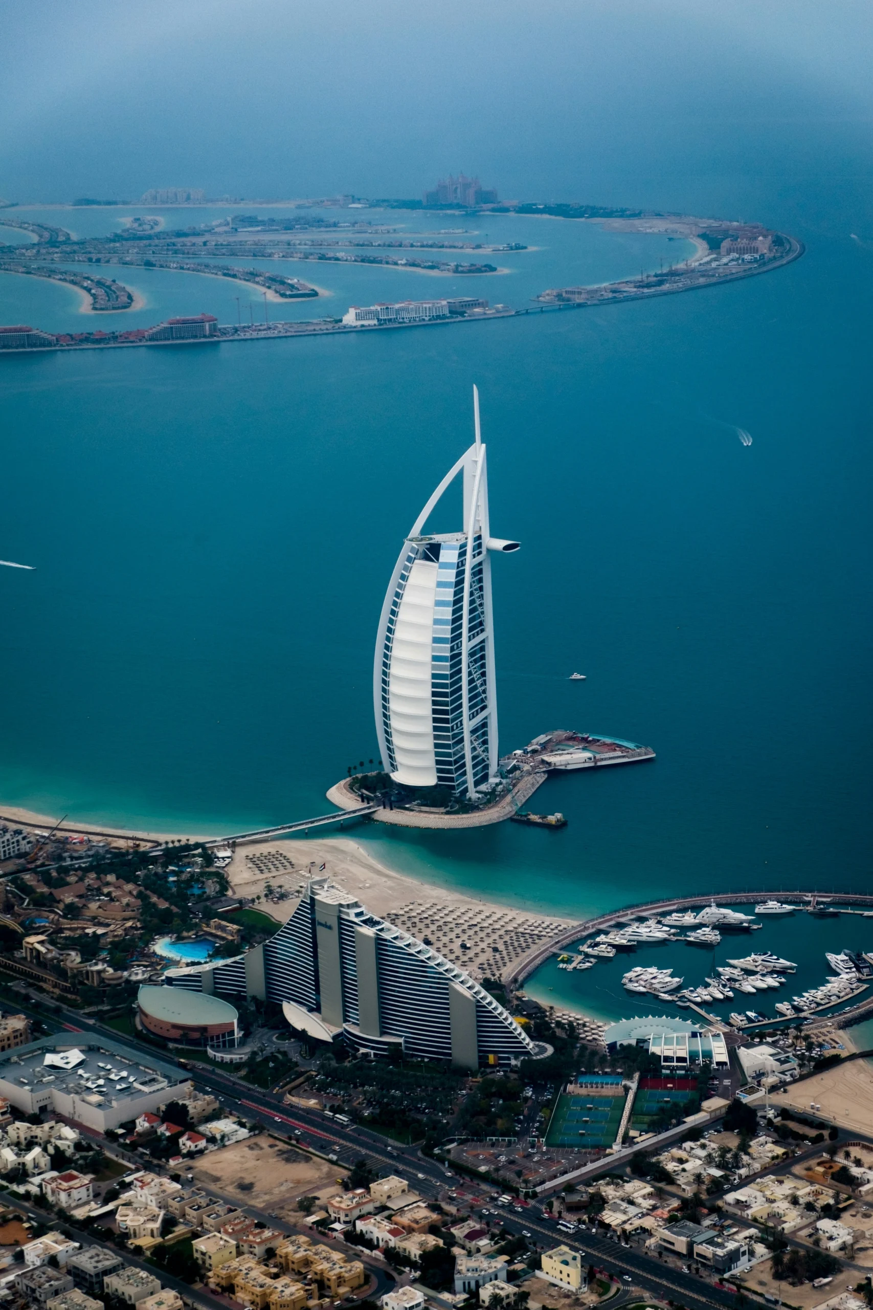 Aerial view of the Burj Al Arab hotel and surrounding coastline in Dubai