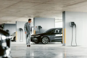 Man in Suit Walking Towards Car